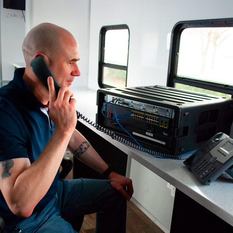 Man talking on portable radio